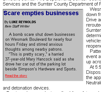 In a gray left-aligned box inside the main story are a headline, a byline, two paragraphs of the story and a link to the rest of the story.